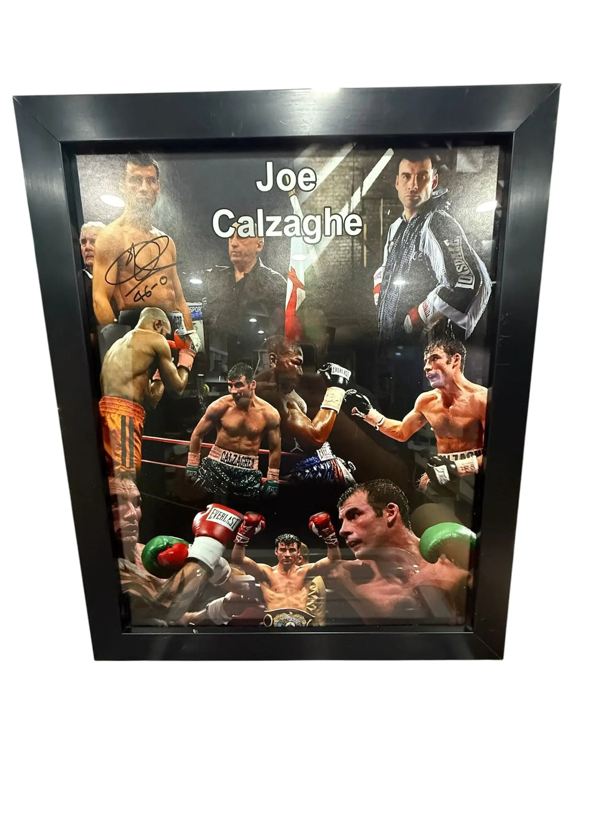 Professionally framed photo montage of Joe Calzaghe's boxing career, clearly showing his hand-signed autograph on one of the photo elements.