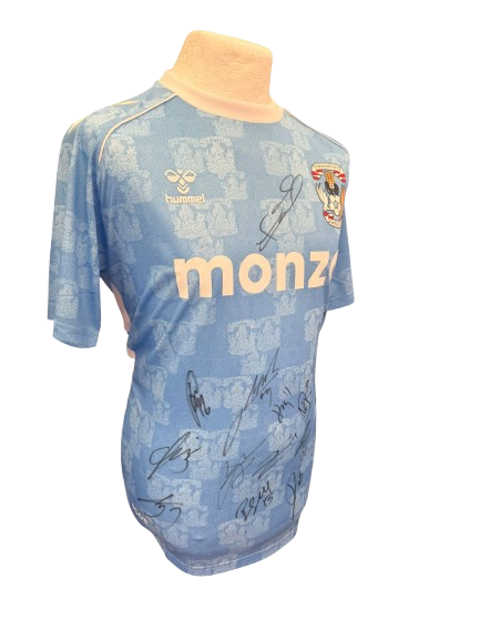 Detailed close-up of the signatures on the sky blue fabric of the 25/26 CCFC promotion kit.