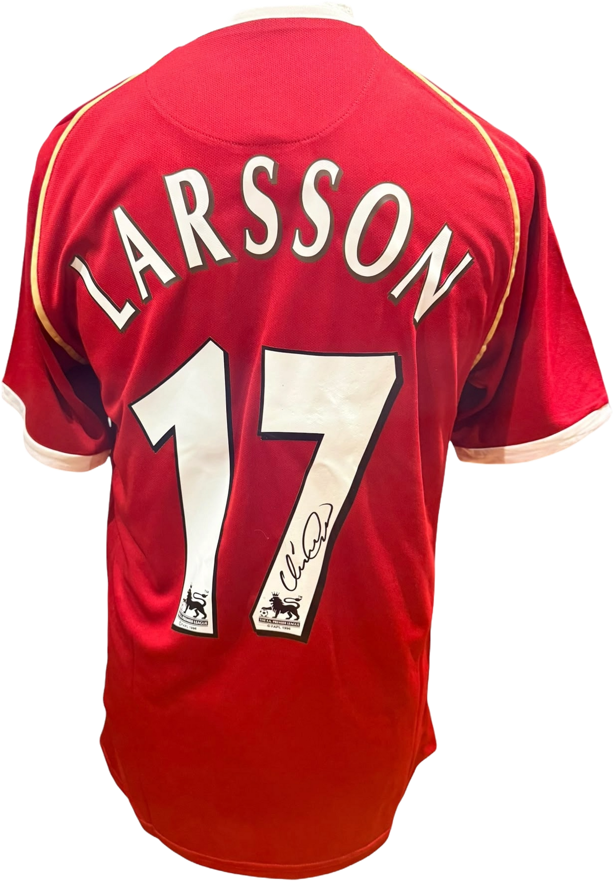 Rear view of a retro replica Manchester United home shirt hand-signed by striker Henrik Larsson, displayed alongside the Certificate of Authenticity.