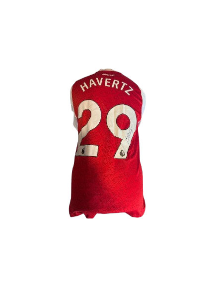 Authentic Kai Havertz signed Arsenal home shirt 25/26 featuring a bold black signature on the red and white jersey with tonal Gothic A patterns.