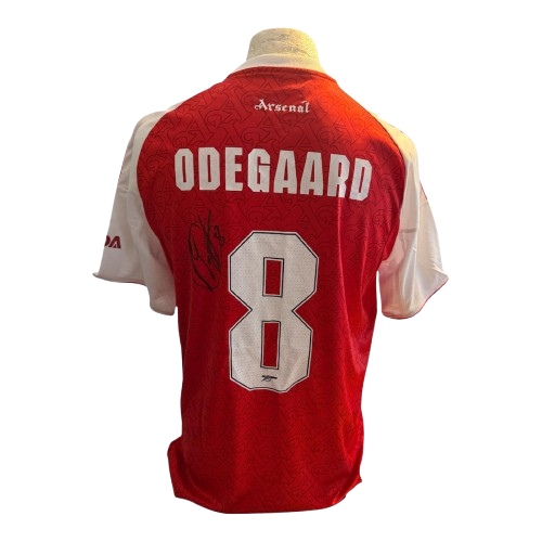 Authentic Martin Odegaard hand-signed Arsenal home shirt 25/26 featuring the Official Club Font and Certificate of Authenticity.