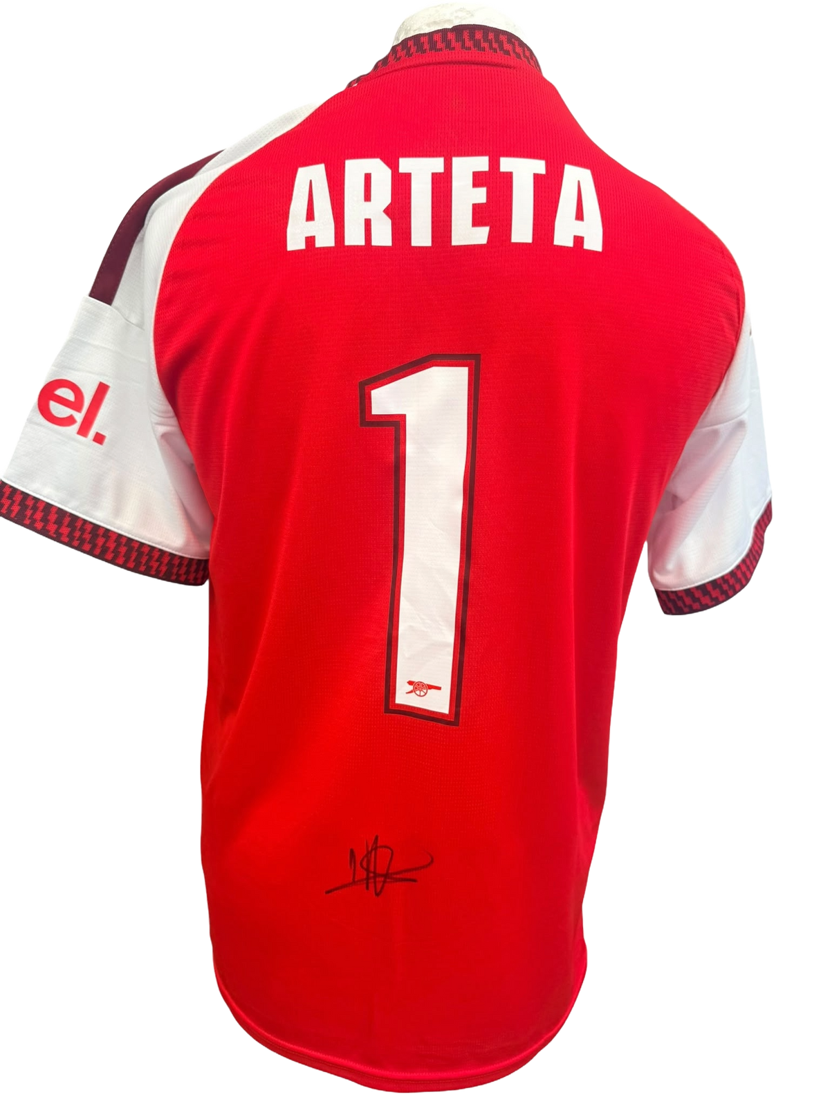 Back view of a 2026/27 Arsenal home shirt hand-signed in permanent marker by manager Mikel Arteta.