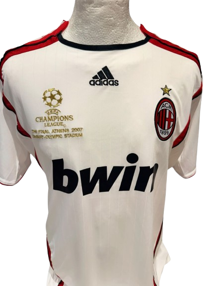 Official 2006/07 AC Milan home shirt with Athens 2007 embroidery hand-signed by Paolo Maldini in bold permanent ink.