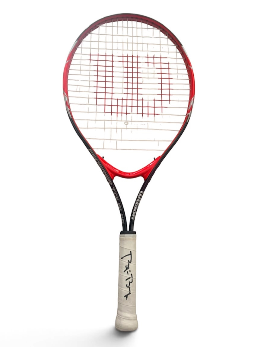 Full view of the signed Björn Borg tennis racket showcasing the hand-signed autograph clearly across the handle grip
