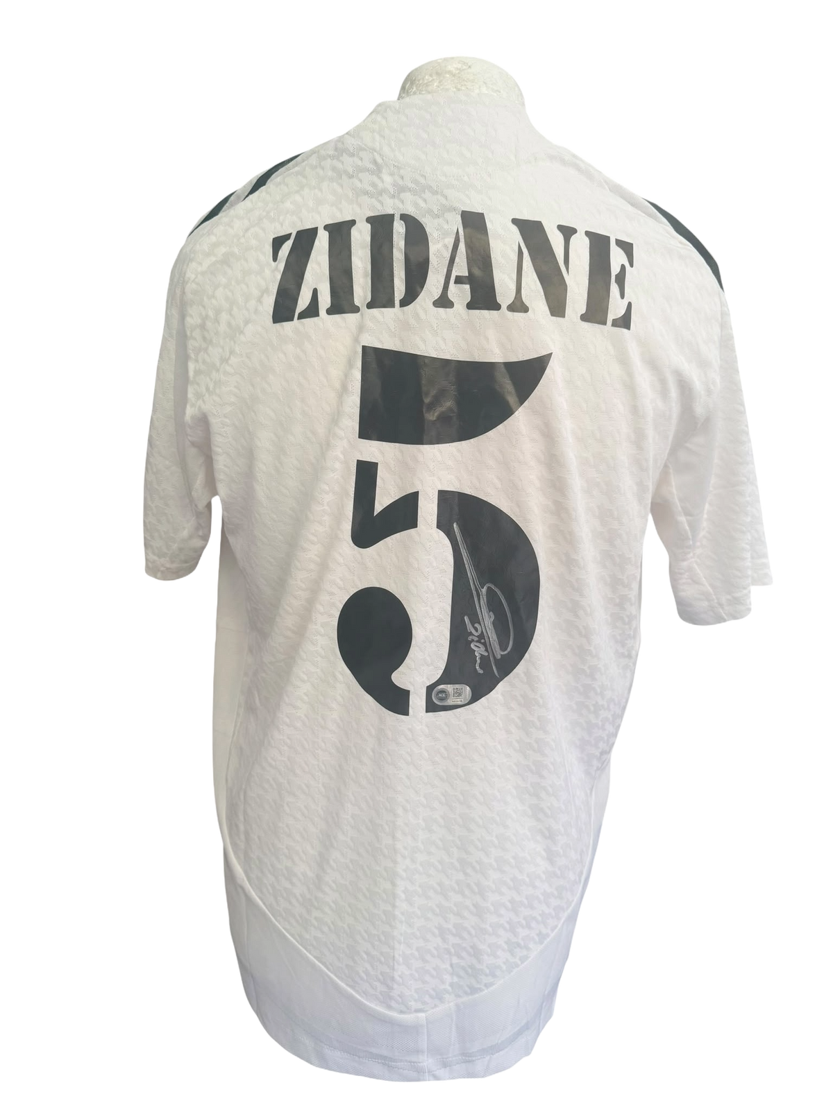 Classic white 2001/02 retro Real Madrid home shirt hand-signed in permanent marker by Zinedine Zidane.