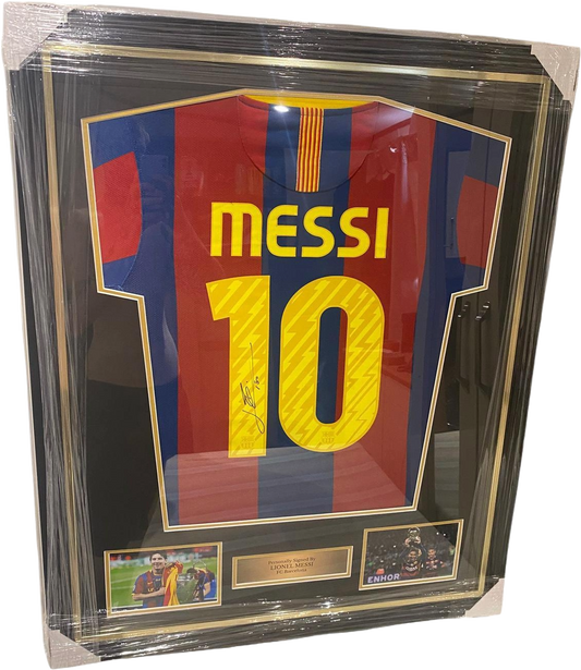 A historical retrospective of Lionel Messi celebrating during the 2010/11 season with Barcelona, showcasing his signed home jersey.