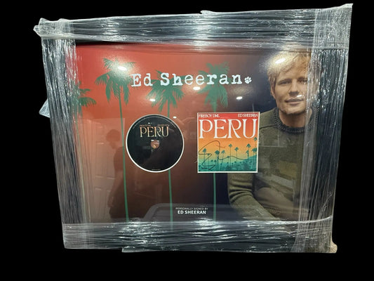 Professionally framed CD single of 'Peru' (Ed Sheeran), clearly showing his hand-signed autograph on the CD sleeve or insert.