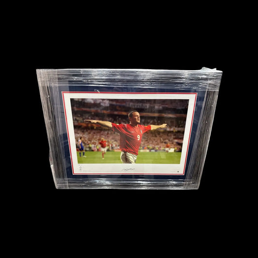 Professionally framed photograph of Wayne Rooney, clearly showing his hand-signed autograph on the image mount.