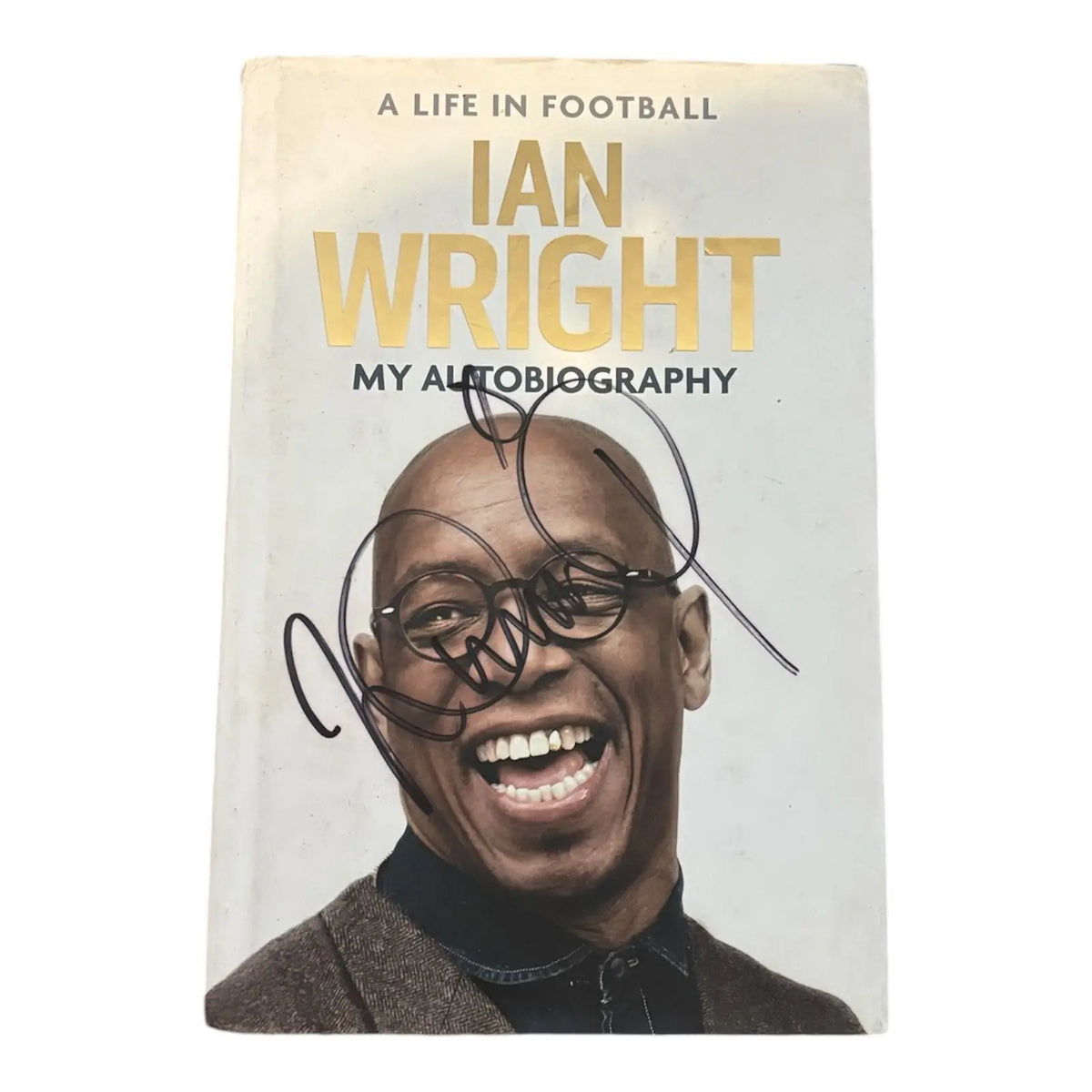 Signed autobiography book by Ian Wright, showing his clear signature on the inner title page. Book cover and signature placement are visible.