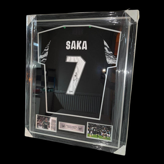 BUKAYO SAKA SIGNED AND FRAMED 24/25 AWAY SHIRT
