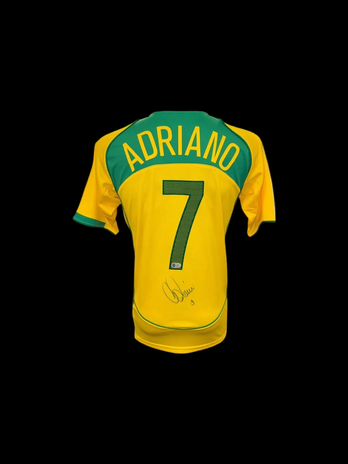 Official Brazil home shirt hand-signed by striker Adriano in bold permanent ink.