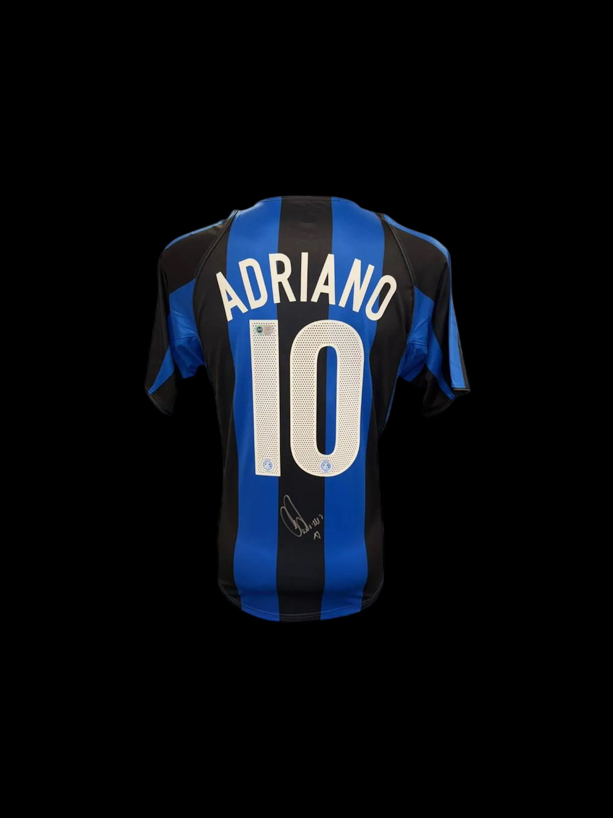 Official Inter Milan home shirt hand-signed by striker Adriano in bold permanent ink.