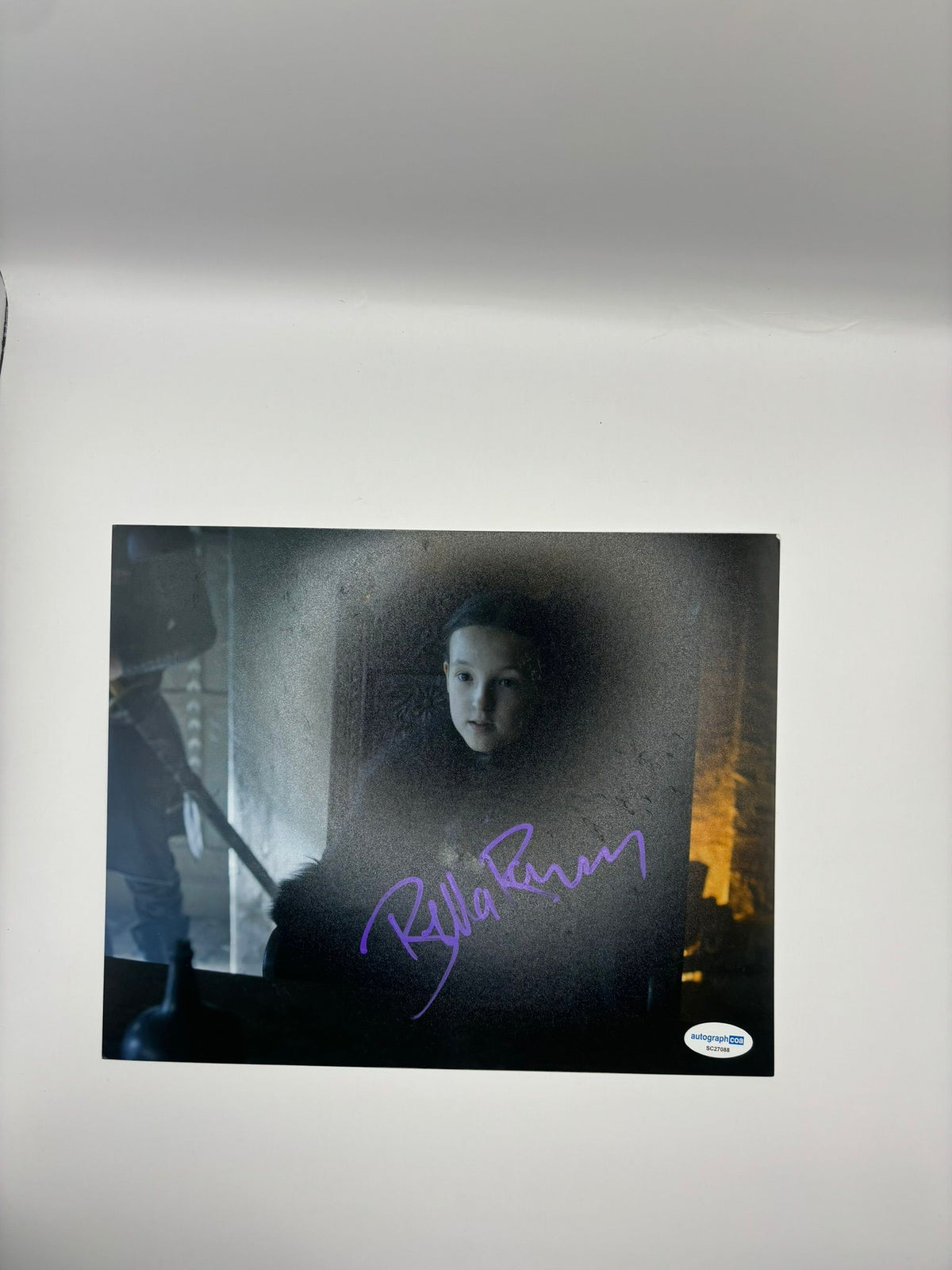 Authentic high-gloss photograph of Bella Ramsey as Lyanna Mormont in Game of Thrones, hand-signed by the actress in bold ink with an official Limelight Memorabilia COA.