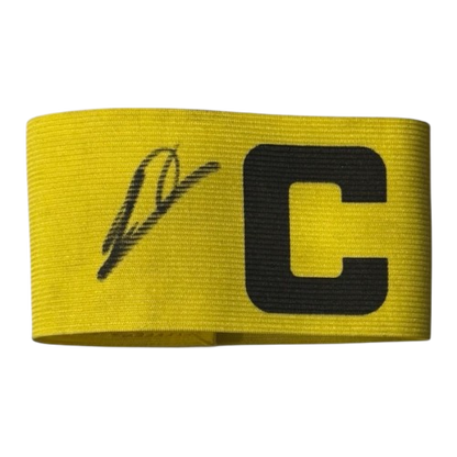 Authentic hand-signed Bruno Fernandes Manchester United captain's armband with bold signature.