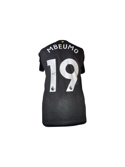 Authentic Bryan Mbeumo signed Manchester United third shirt 25/26, featuring a bold signature on the 90s-inspired black jersey with yellow and blue trim.