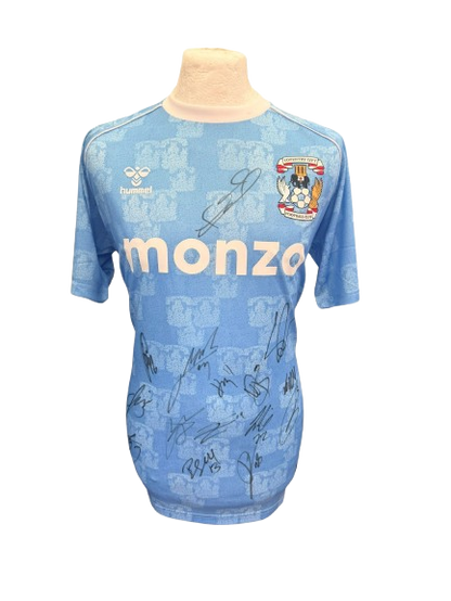 Front view of the 2025/26 Coventry City home shirt hand-signed by the full promotion-winning squad.