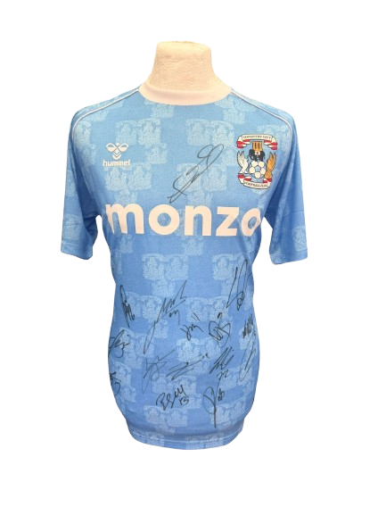 Front view of the 2025/26 Coventry City home shirt hand-signed by the full promotion-winning squad.