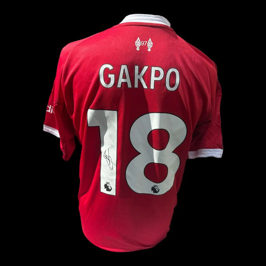 Authentic hand-signed Cody Gakpo Liverpool home shirt 25/26 with official pinstripe design.