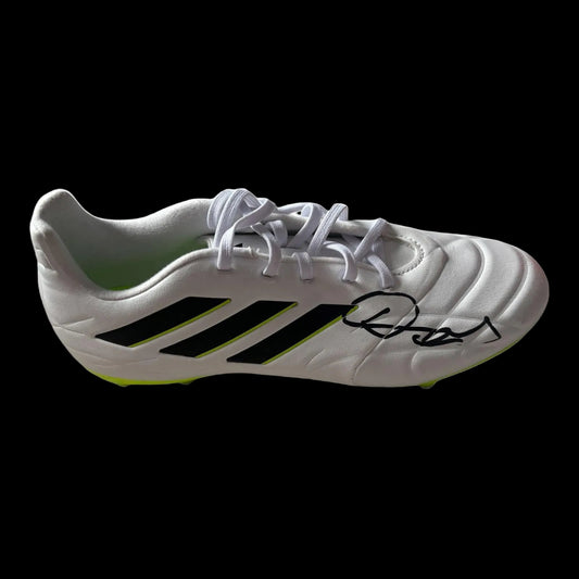 A professional-grade football boot hand-signed by Daniel Agger in bold permanent marker on the side, featuring an official Limelight Memorabilia COA.