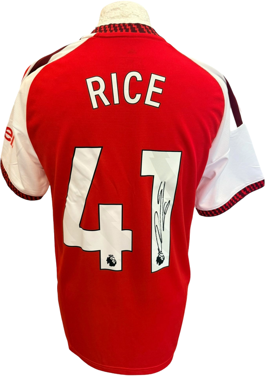 The reverse of the 2026/27 Arsenal home shirt showcasing Declan Rice's hand-signed autograph clearly on his squad number.