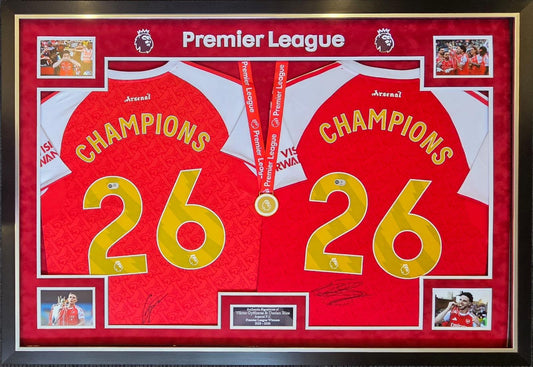 Luxury framed display showcasing two hand-signed Arsenal shirts by Declan Rice and Viktor Gyokeres with gold Champions 26 lettering and a replica winners medal.