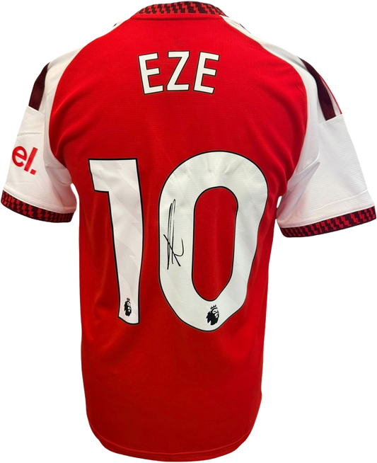The reverse of the 2026/27 Arsenal home shirt showcasing Eberechi Eze's hand-signed autograph clearly on his squad number.
