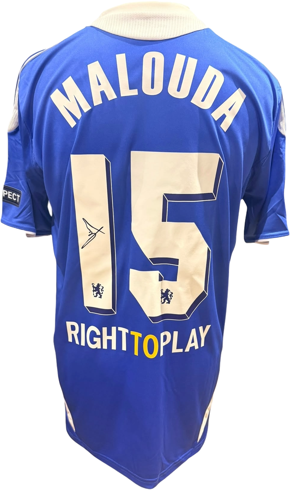 Front view of a replica 2011/12 Chelsea home shirt hand-signed by winger Florent Malouda, displayed alongside the Certificate of Authenticity.