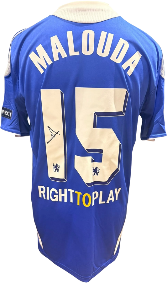 Front view of a replica 2011/12 Chelsea home shirt hand-signed by winger Florent Malouda, displayed alongside the Certificate of Authenticity.