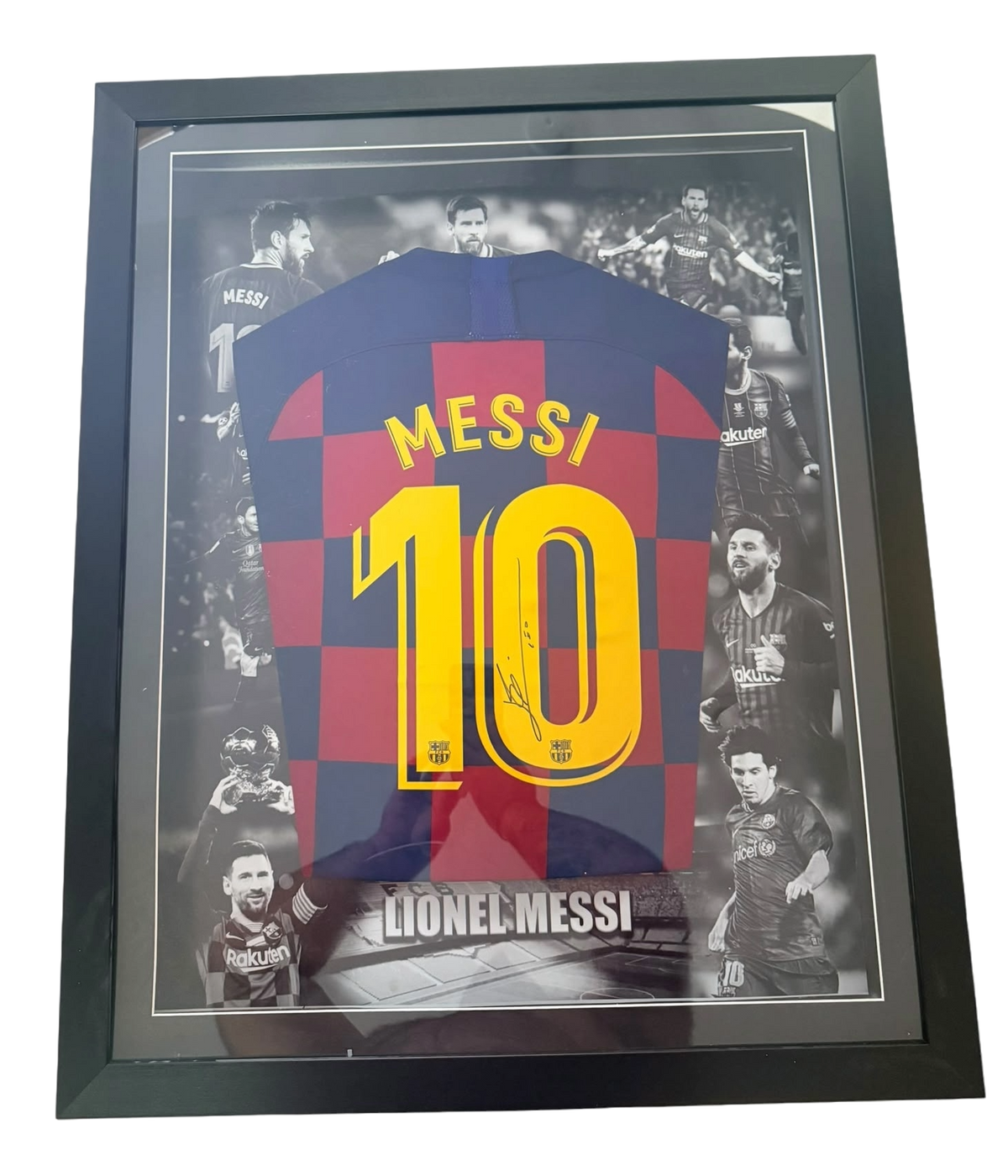 Front view of a framed 2019/20 FC Barcelona home shirt signed by Lionel Messi with LED lighting turned off.