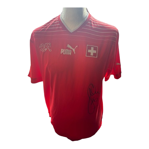 Hand-signed Granit Xhaka Switzerland home shirt with Certificate of Authenticity.