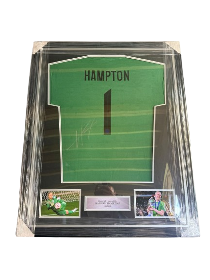 A professionally framed Hannah Hampton hand-signed England Euro 2025 shirt with images of the team celebrating their victory.
