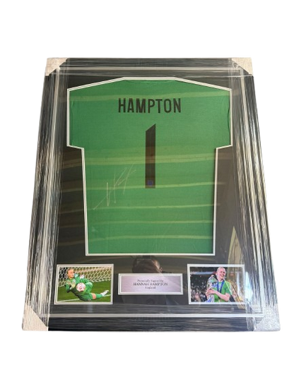 A professionally framed Hannah Hampton hand-signed England Euro 2025 shirt with images of the team celebrating their victory.