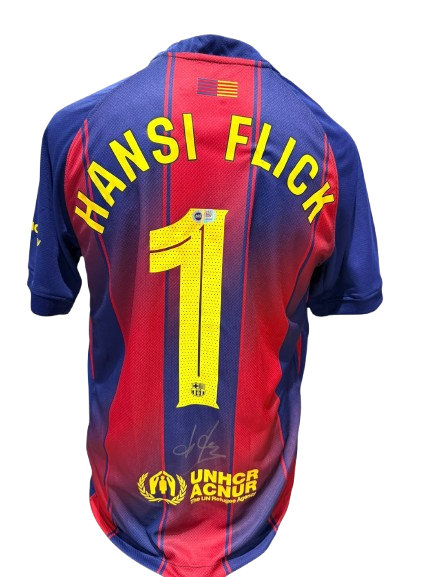 Official FC Barcelona home shirt hand-signed by manager Hansi Flick in bold permanent ink.