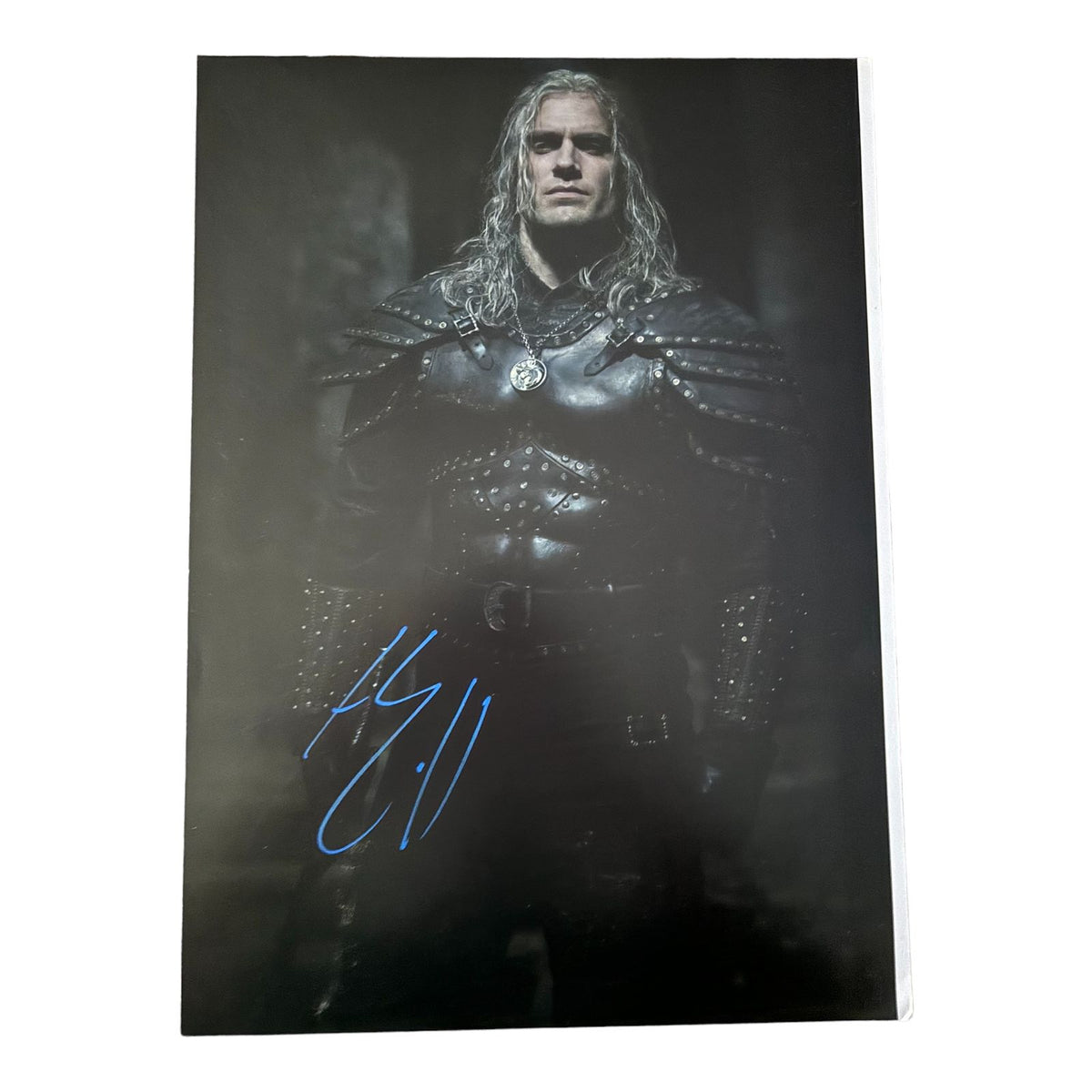 Authentic 8x10 high-gloss photograph of Henry Cavill as Geralt of Rivia in The Witcher, hand-signed by the actor in bold permanent ink with a Limelight Memorabilia COA.