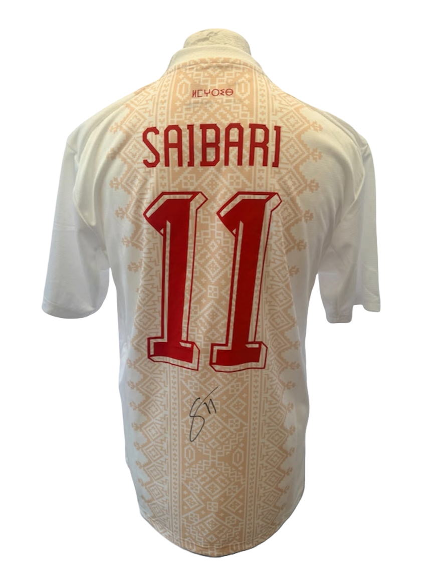 Signed Ismael Saibari Morocco away shirt featuring a bold hand-signed autograph directly across the back of the jersey