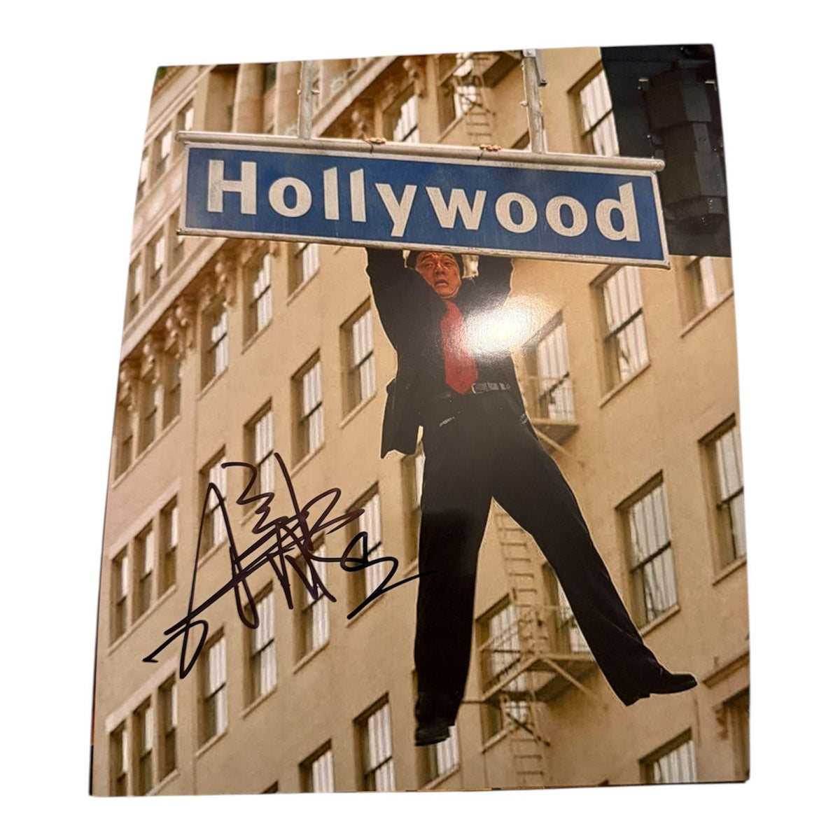 Authentic 8x10 high-gloss photograph of Jackie Chan as Chief Inspector Lee in Rush Hour, hand-signed by the actor in bold permanent ink with an official Limelight Memorabilia COA.