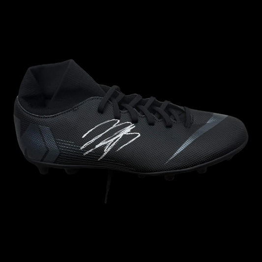A professional-grade football boot hand-signed by Jadon Sancho in bold permanent ink on the side, displayed with an official Limelight Memorabilia COA.