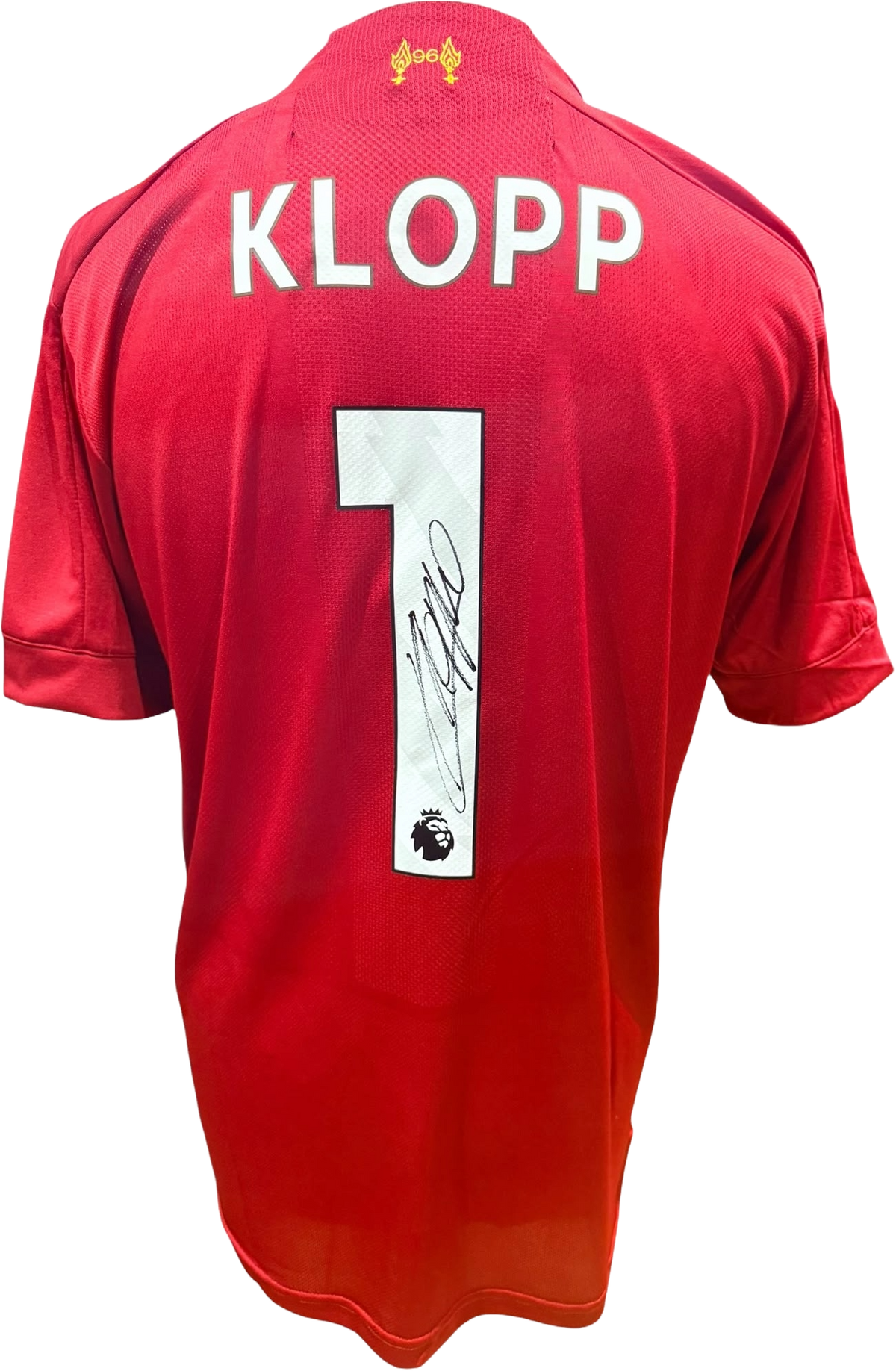 Rear view of a 2019/20 replica Liverpool home shirt hand-signed by manager Jürgen Klopp, displayed alongside the Certificate of Authenticity.