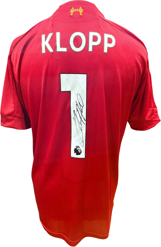 Rear view of a 2019/20 replica Liverpool home shirt hand-signed by manager Jürgen Klopp, displayed alongside the Certificate of Authenticity.