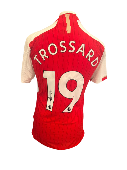 Back view of an authentic 2023/24 Arsenal home shirt hand-signed directly on the squad number by Leandro Trossard.