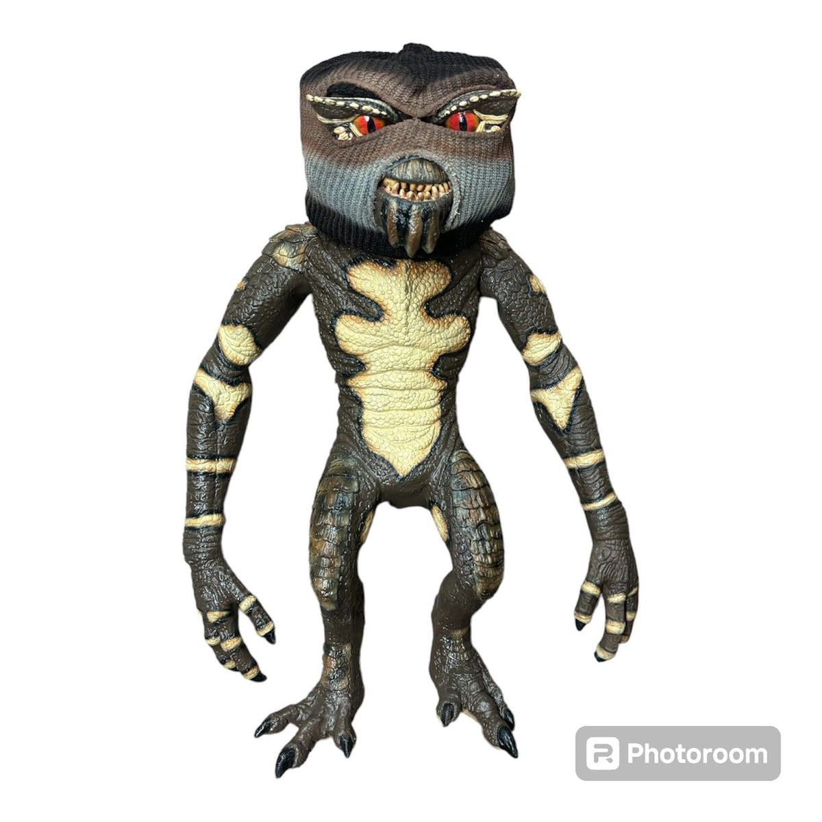 A movie-accurate, life size 1:1 scale Gremlin puppet featuring a hand-insert for posing, realistic reptilian skin textures, and hand-painted features.