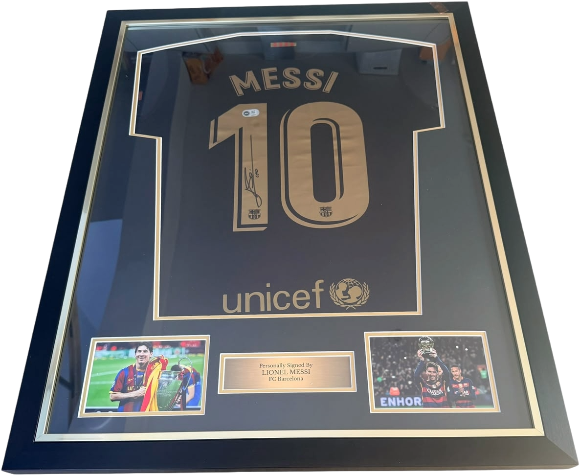 Lionel Messi hand-signed black Barcelona away shirt presented in a premium black display frame with a silver plaque.