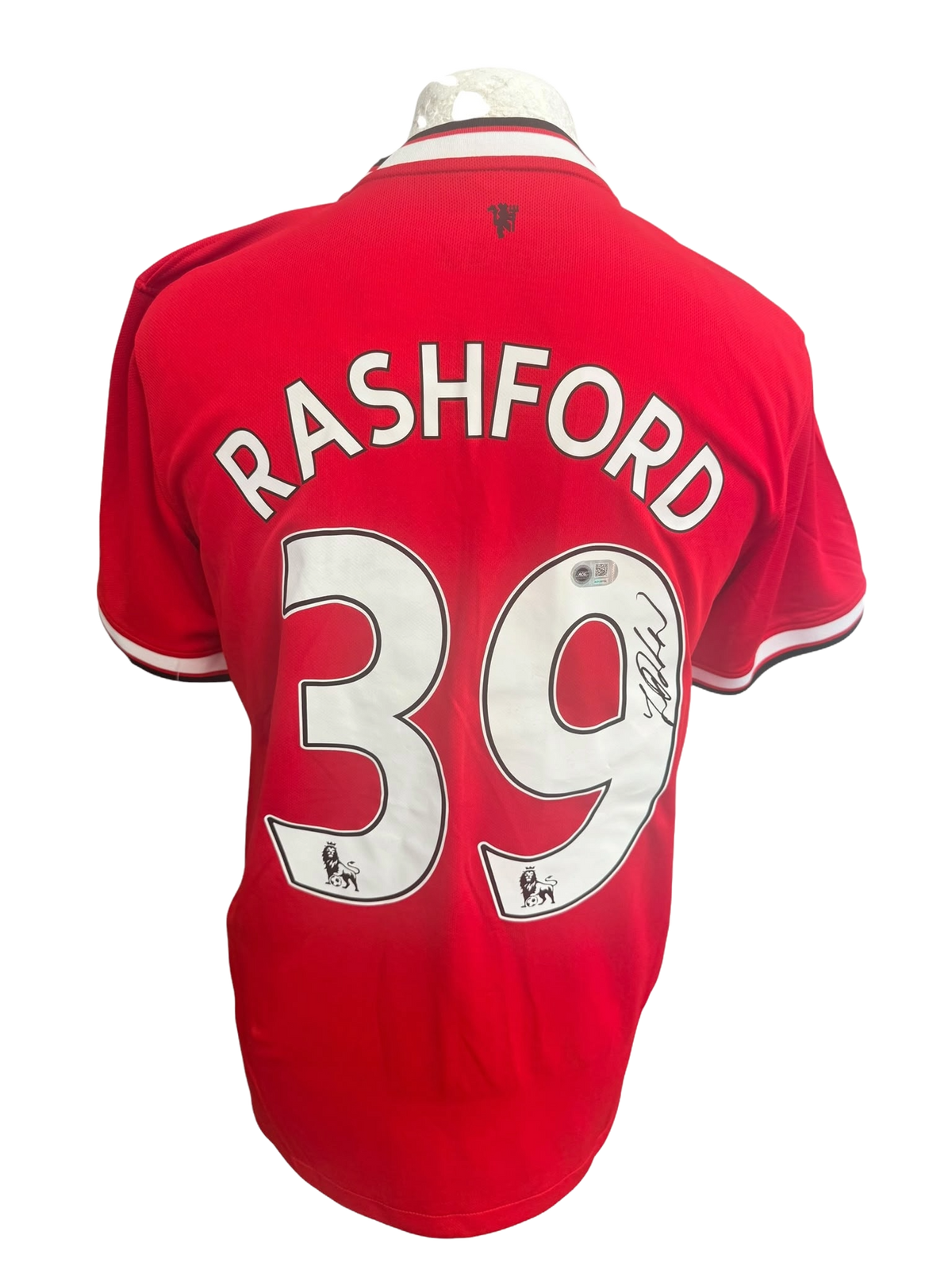 Red Manchester United home jersey from Marcus Rashford's rookie season hand-signed in permanent marker.