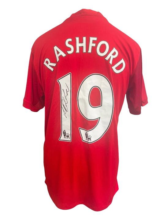 Red 2016/17 Manchester United home shirt hand-signed in permanent marker by Marcus Rashford.