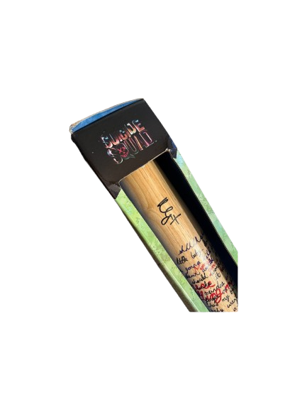 A high-resolution closeup of Margot Robbie's bold black ink signature on the wooden grain of the Harley Quinn "Good Night" replica prop bat.