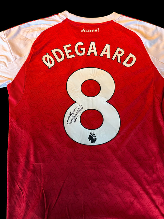 Authentic Martin Odegaard hand-signed Arsenal home shirt 25/26 featuring official Premier League font.