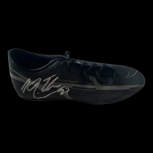 A professional-grade football boot hand-signed by Matheus Nunes in bold permanent ink on the side, displayed with an official Limelight Memorabilia COA.