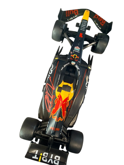 Top-down view of a working remote control Red Bull F1 car hand-signed on the bodywork by Max Verstappen.