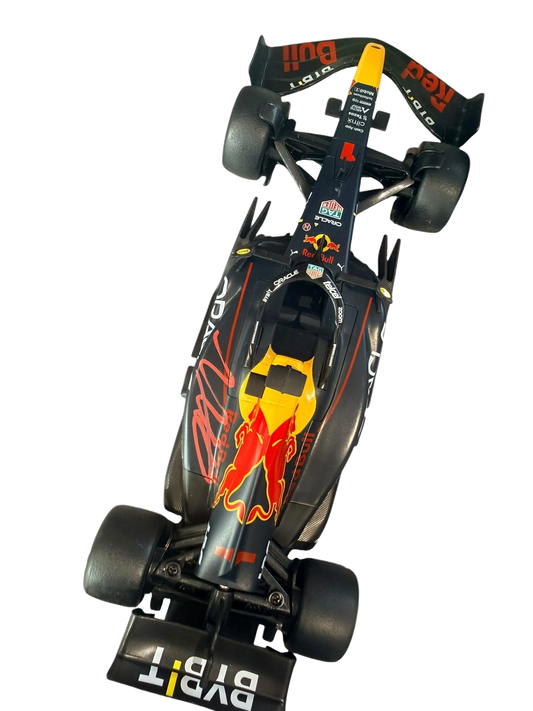 Top-down view of a working remote control Red Bull F1 car hand-signed on the bodywork by Max Verstappen.