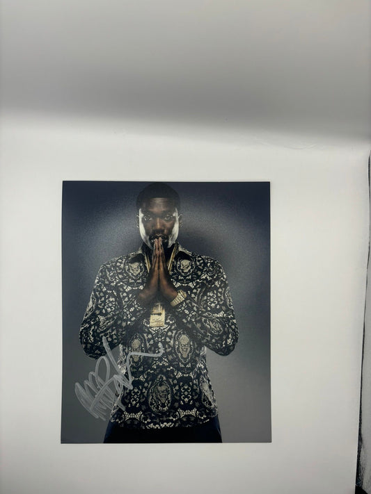 High-gloss 8x10 photograph of Meek Mill performing on stage, hand-signed by the artist in bold permanent ink with an official Limelight Memorabilia COA.